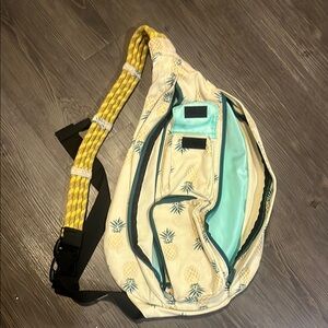 Kavu Pineapple Print Sling Bag with Yellow and Aqua Accents